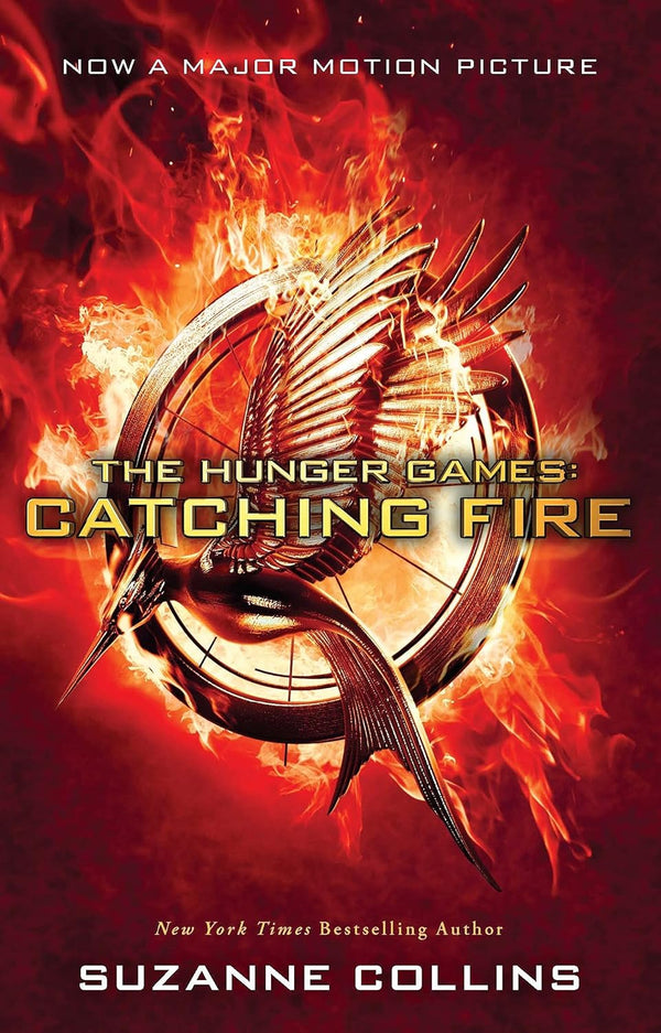 Catching Fire Movie-Tie-in-Edition [Paperback] Suzanne Collins by Suzanne Collins